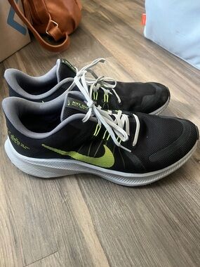 Nike Men's Black Athletic Shoes with Neon Yellow Swoosh